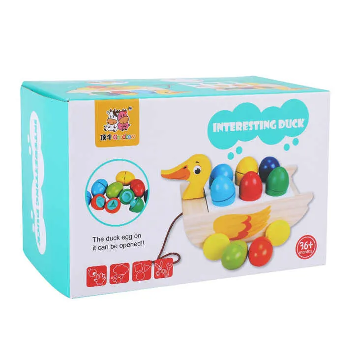 لعبة خشبية ثلاثة في واحد مقطورة بطة مكعب . Three-in-one wooden toy trailer duck cube